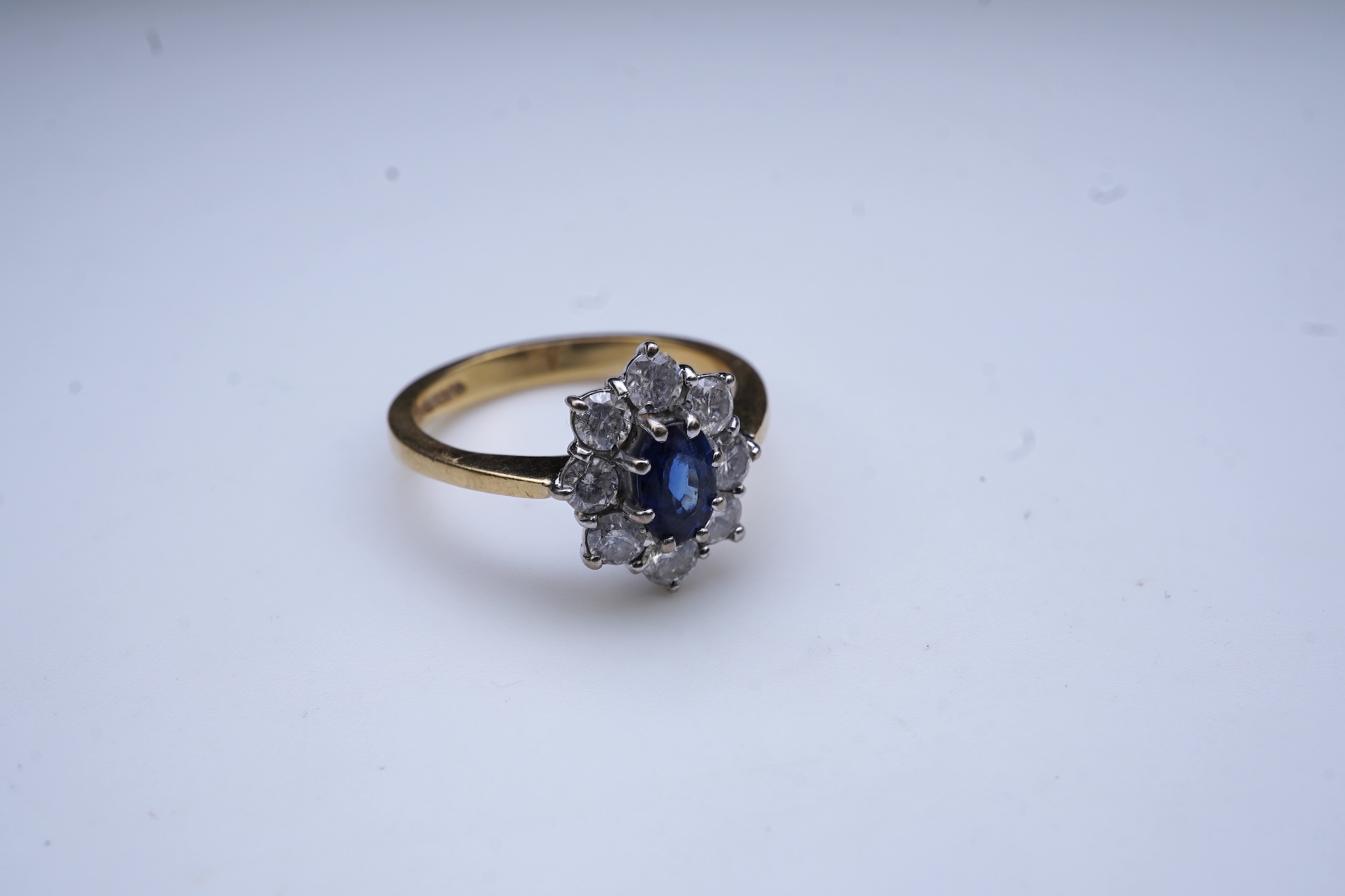 A sapphire and diamond cluster ring